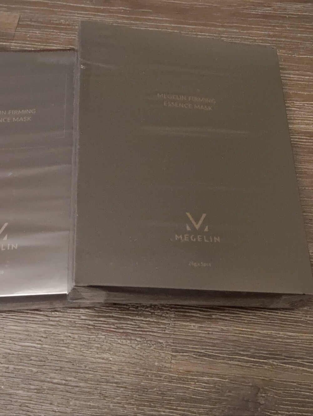 Megelin Firming Essence Mask - Black Packaging